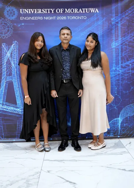 Three guests in evening attire at the media booth