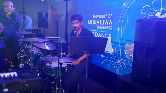 Drummer performing with the live band